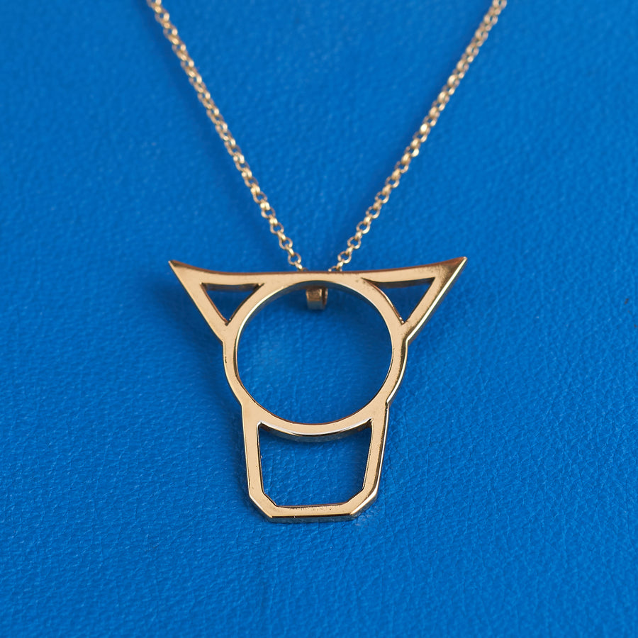 Cow's Head Pendant-The third member of the Irish Animal collection, the Cow's Head is wonderfully symmetrical. The simple shapes are super as a pendant hanging below the throat. This piece is available in sterling silver, gold plate or 9ct gold, and is 3cm tall and 3cm wide at its widest point. It is only available as a pendant and comes on an 18