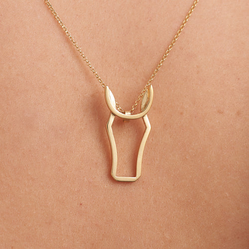 Irish Horse Pendant in Gold-The Horse is an elegant and majestic animal, a hero in Irish culture and adored all over the world. Evolving the contemporary Irish Animal collection, the Irish Horse Head pendant is delicate and elegant, complementing any outfit. The pendant comes on an 18