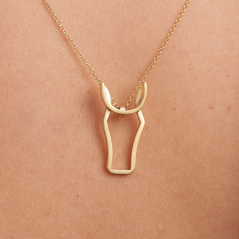 Irish Horse Pendant in Gold-The Horse is an elegant and majestic animal, a hero in Irish culture and adored all over the world. Evolving the contemporary Irish Animal collection, the Irish Horse Head pendant is delicate and elegant, complementing any outfit. The pendant comes on an 18