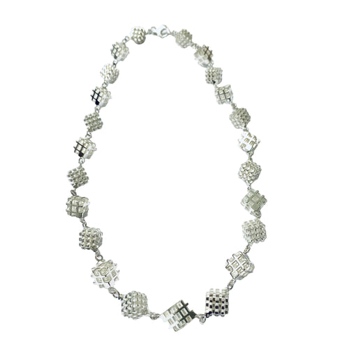 3D hashtag art necklace with positive negative space hashtag cubes in a repeat pattern necklace