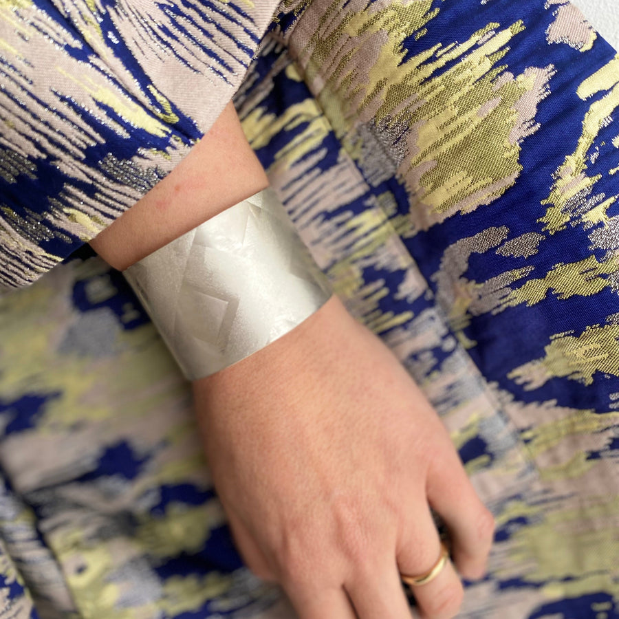Pattered silver wrist cuff handforged in Ireland