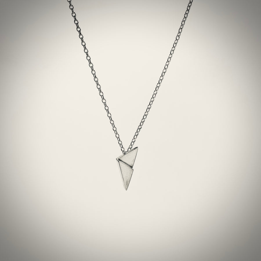 Sterling silver clash pendant suspended on silver belcher chain handmade in Ireland