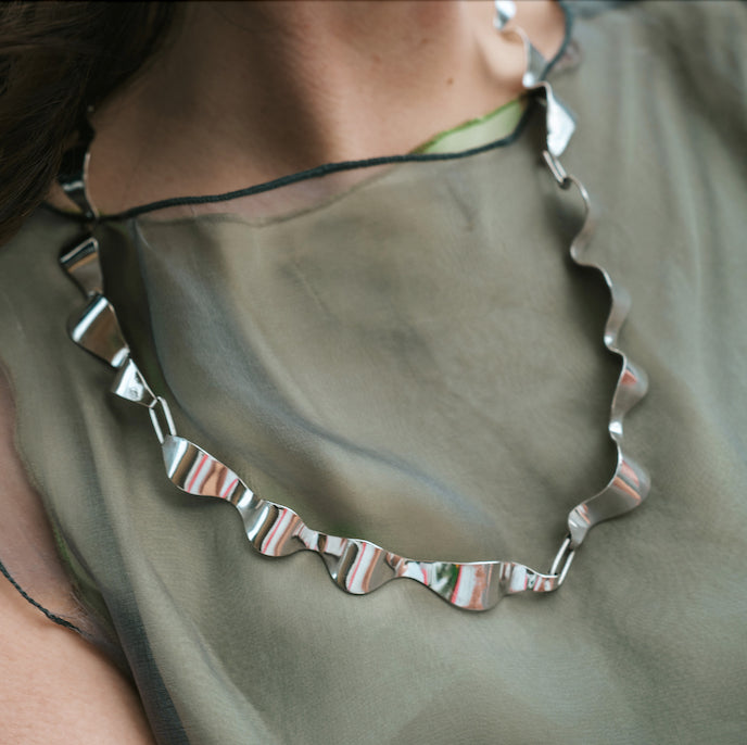 gentle undulating wave chain necklace featuring sensual silhouette of contemporary handmade jewellery