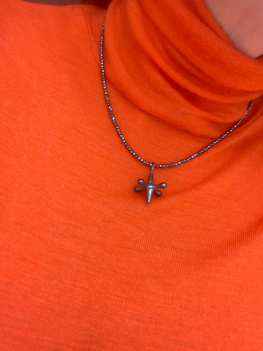 single thread of black spinel gemstones with black jack pendant