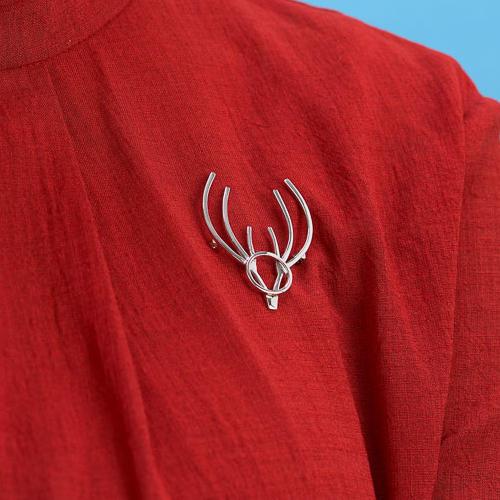 silver stag head brooch handmade in Ireland by female artisan designer jeweller