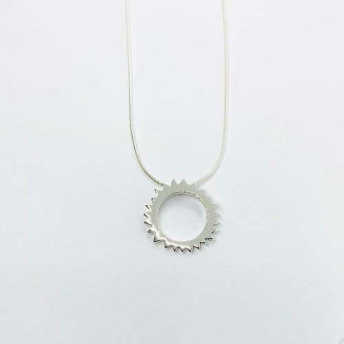 sterling silver sun pendant handmade in ireland a perfect gift for a young person