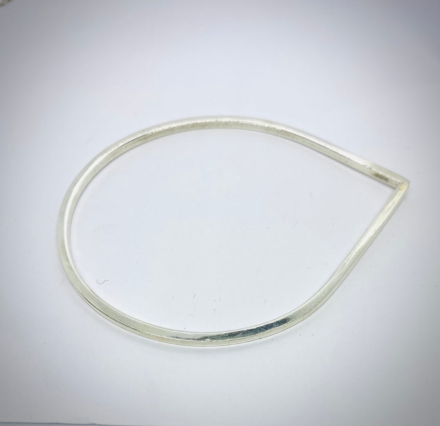 Hallmarked sterling silver modern style bangle..