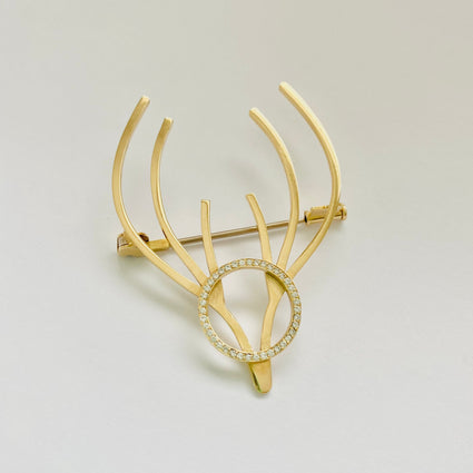 Deer brooch in 18ct gold with 39 diamonds set in the face handmade in Ireland